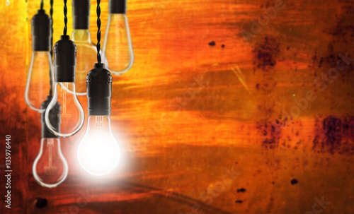 Teamwork and innovation concept - bulbs on the wall background