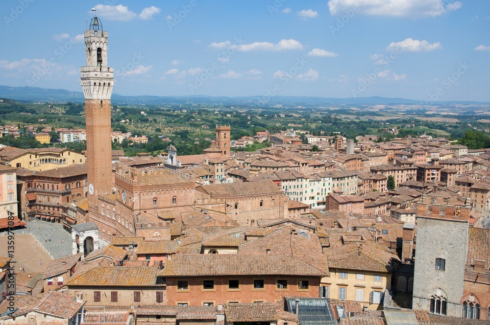 Historic city Siena with tower Torre del Mangia, Tuscany, Italy