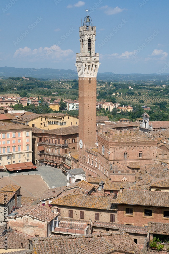 Historic city Siena with tower Torre del Mangia, Tuscany, Italy