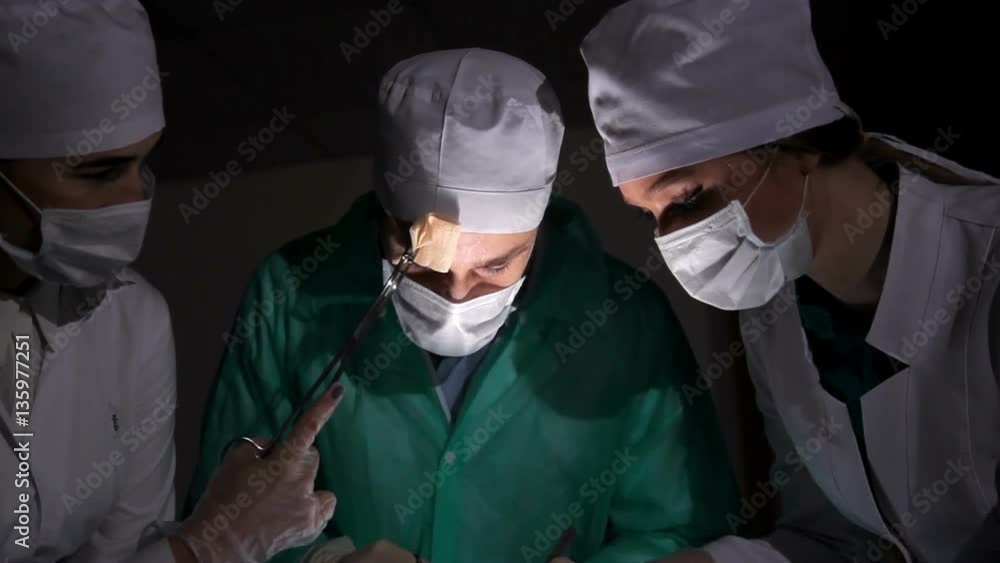 Team surgeon at work in operating room Team surgeon at work in operating room