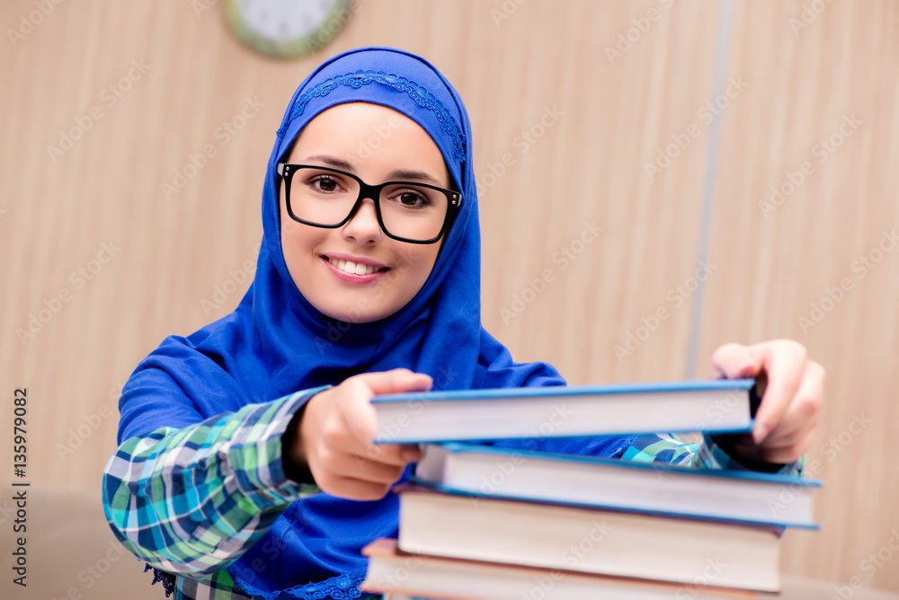 Muslim girl preparing for entry exams Muslim girl preparing for entry exams