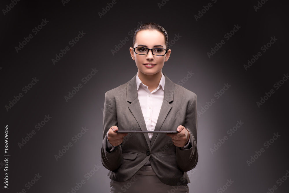 Young businesswoman working with tablet computer Young businesswoman working with tablet computer