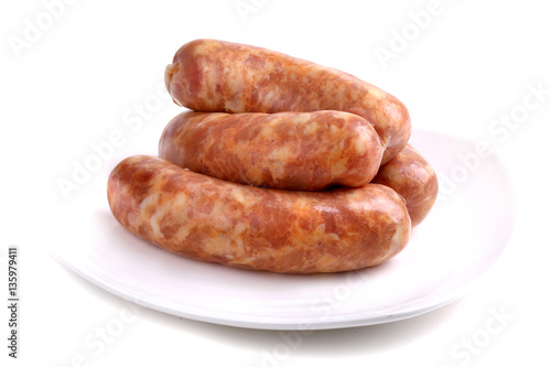 Four raw sausages