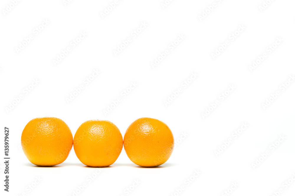 A fresh orange isolated over white background A fresh orange isolated over white background