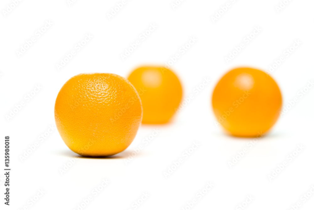 A fresh orange isolated over white background A fresh orange isolated over white background