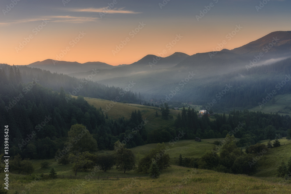 Ukraine. Carpathians. Summer morning at the village Dzembronya