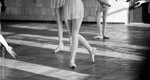 Ballerinas dancing in the ballet hall. Emotional children`s ballet. Soft focus