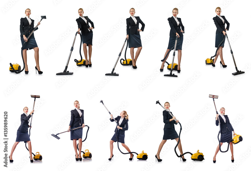 Businesswoman cleaning with vacuum cleaner on white