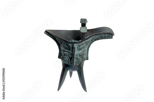 isolated ancient bronze cup on white background