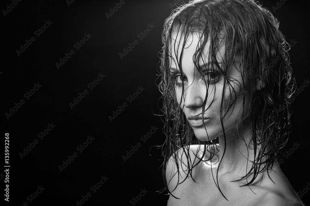 beautiful woman with wet hair looking at camera, monochrome image beautiful woman with wet hair looking at camera, monochrome image