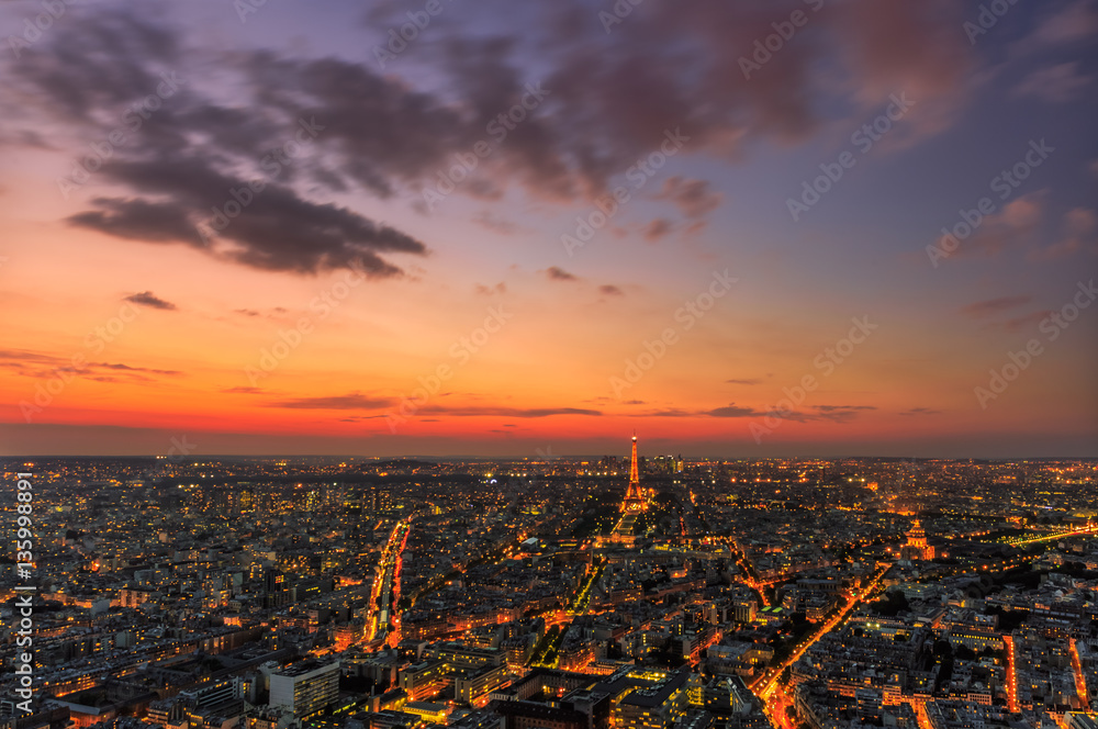 Paris cityscape with tiny Eiffel Tower from Montparnasse rooftop, Paris