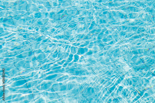 Blue ripped water in swimming pool.