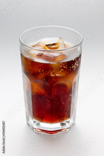 Glass with a glass of Coke rum, cocktai ice cubes