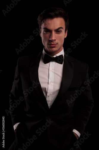 portrait of an elegant man in tuxedo and bowtie