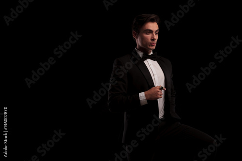 elegant man in tuxedo wearing a big gold ring © Viorel Sima