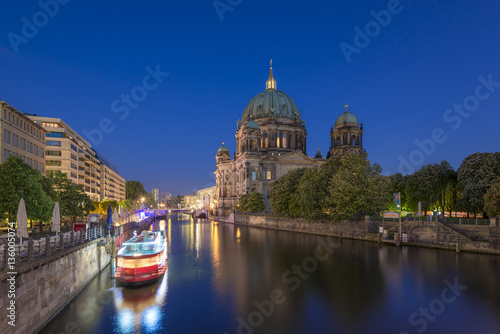 Berlin Cathedral (Berliner Dom) on Museum Island (Museumsinsel) and tour boat on Spree River at evening, Berlin Mitte, Germany, Europe 