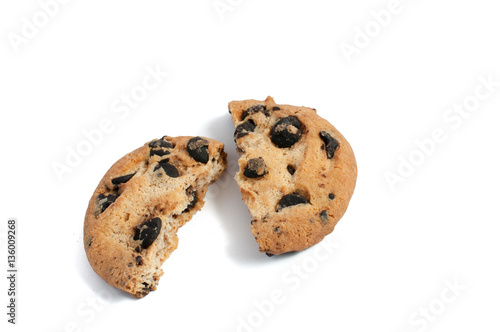 delicious cookies with chocolate broken on a white background