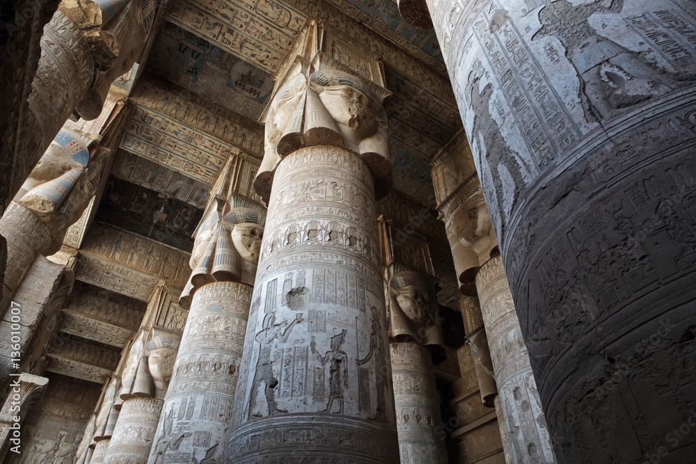 Pillars decorated with face of the Egyptian goddess Hathor in Dendera temple  