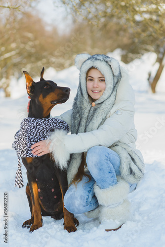 joyful children playing in snow. Two happy girls having fun outside winter day