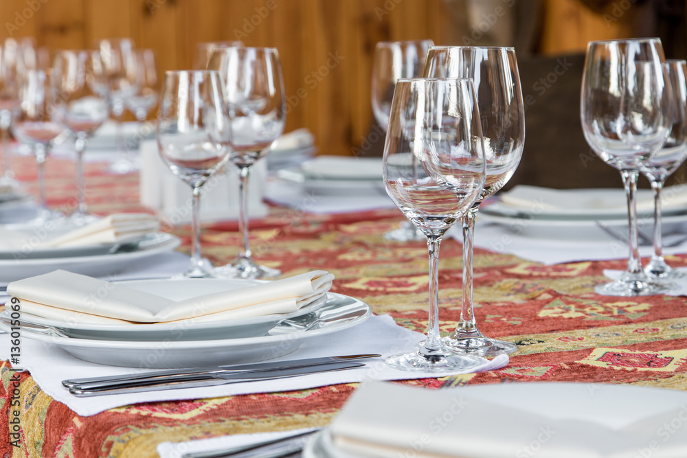 Table served with dishes, close up Table served with dishes, close up