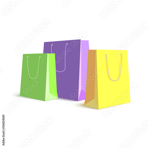 Set of paper, colored shopping bags, resizable vector illustration. Purple, green and yellow bags for shopping and gifts on white background
