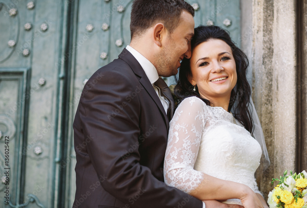 Lovely hug of the young and happy couple Lovely hug of the young and happy couple