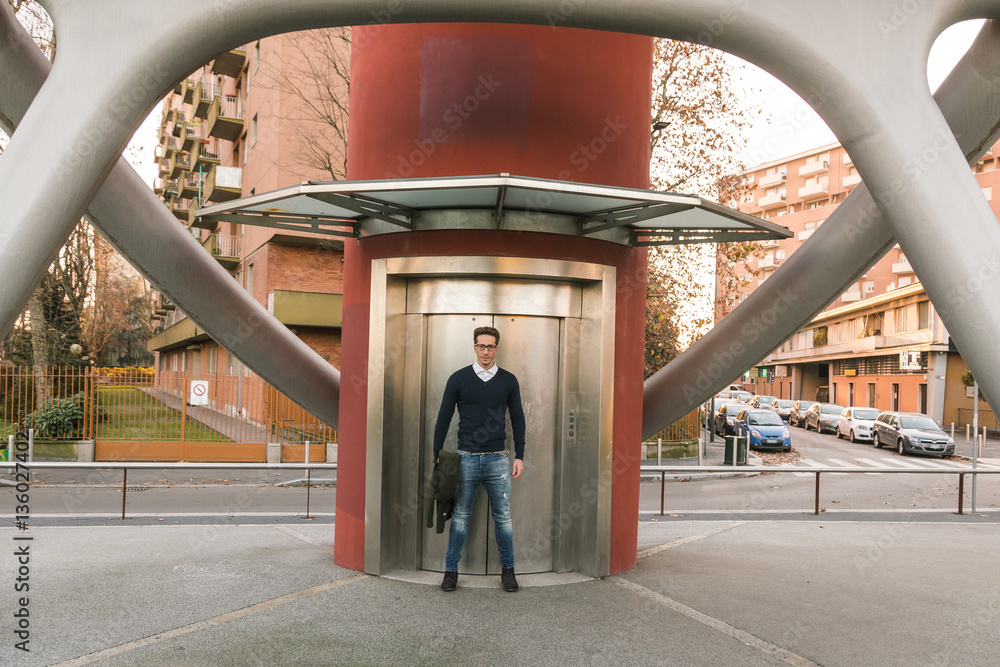 Young handsome man posing in an urban context Young handsome man posing in an urban context