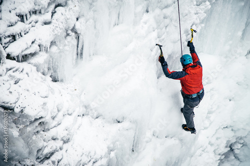 men climbed a frozen waterfall, icicle
