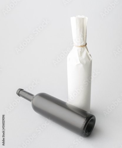 Wallpaper Mural Two wine bottle are standing on gray background Torontodigital.ca