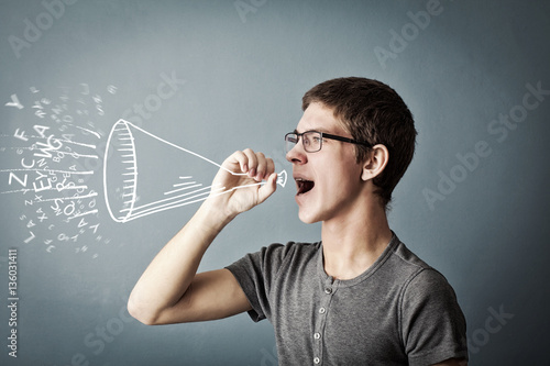 Teen shouting with his megaphone