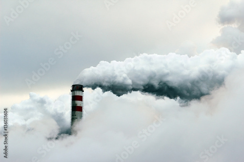 big cloud of smoke coming out of power plant chimney, pollution