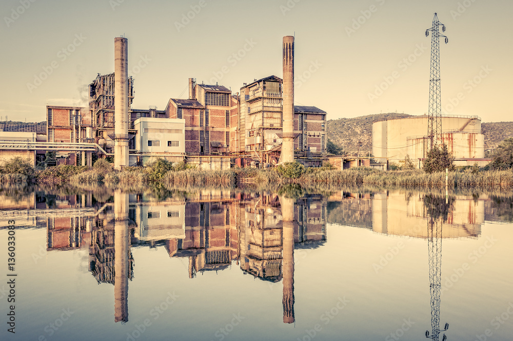 Old Factory. Chemical plant. Pipes,smokestacks,storage tank and