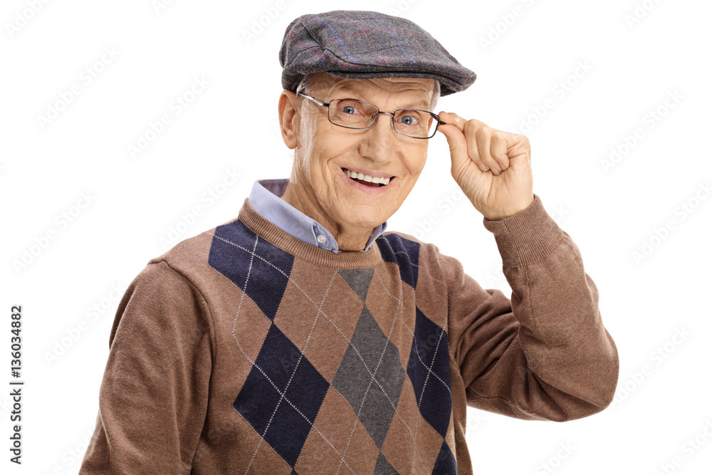 Elderly man smiling and looking at the camera Elderly man smiling and looking at the camera