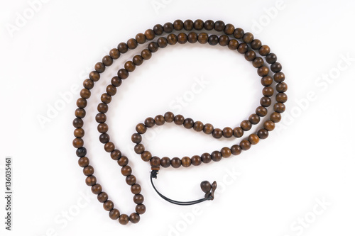 Wooden beads are isolated on a white background