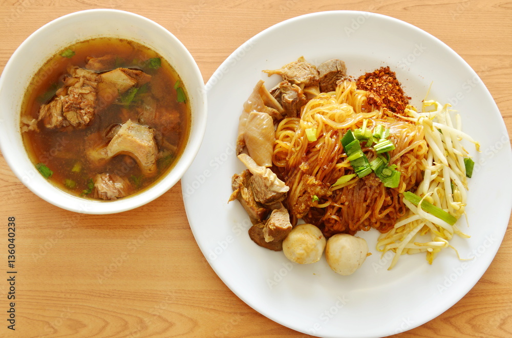dried thin rice noodle topping braised pork and brown rib soup dried thin rice noodle topping braised pork and brown rib soup