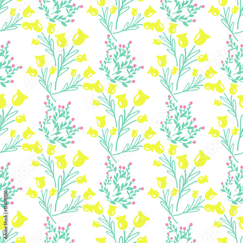 Floral seamless pattern in green and yellow colors. © Annakristal