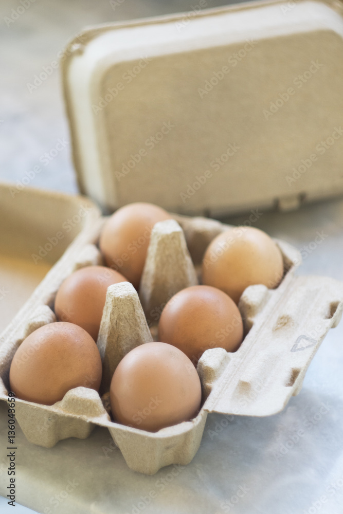 Eggs with the boxes package put on the table Eggs with the boxes package put on the table