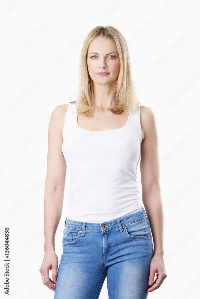 Female portrait. Shot of a confident mature woman standing against at white background. Female portrait. Shot of a confident mature woman standing against at white background.