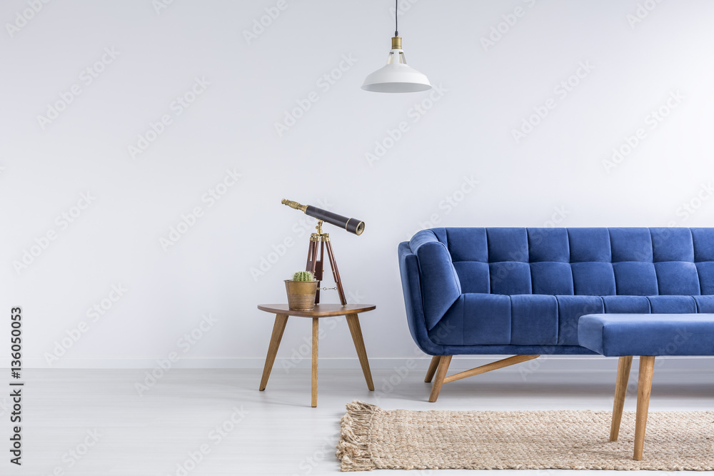 Bright apartment with blue sofa - obrazy, fototapety, plakaty 