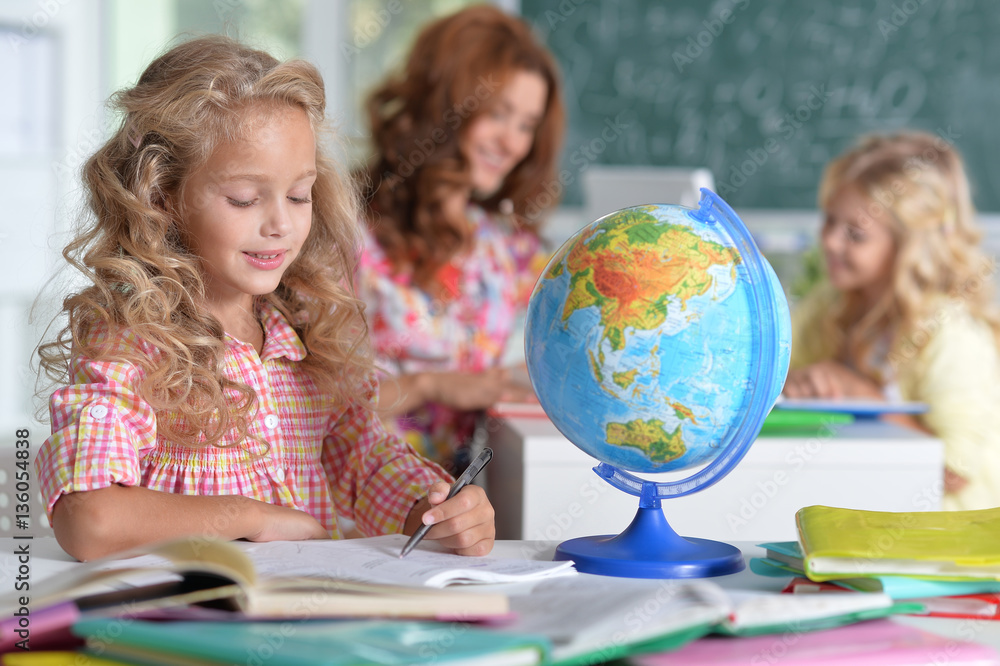 Fototapeta premium teacher with two girls 