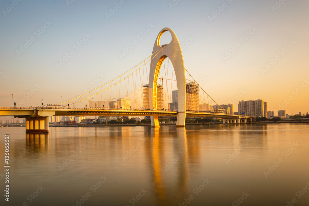 Modern bridge in Zhujiang River and modern building of financial district in guangzhou city China