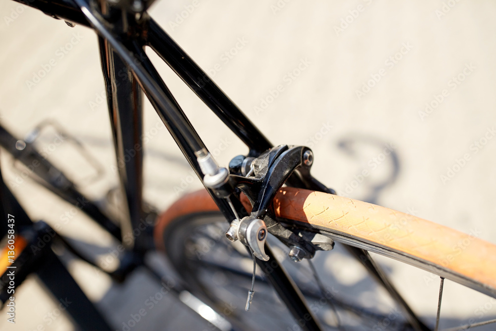close up of fixed gear bicycle on street close up of fixed gear bicycle on street