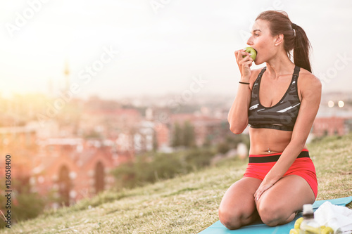 athletic woman resting after working out