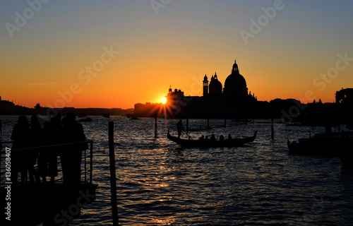 Venice lagoon sunset with gondola