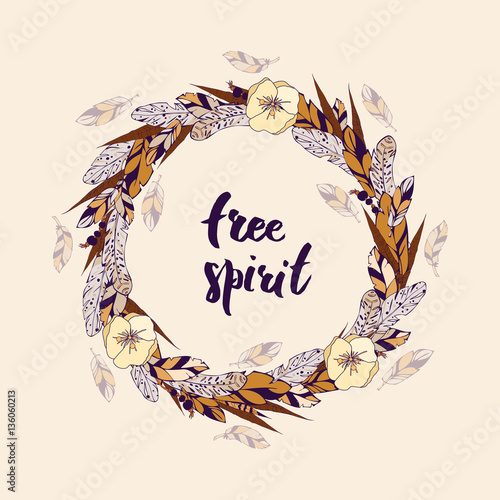 Vector flower wreath of feathers with flowers in a boho style. Lettering free spirit is in the center of the wreath. 
