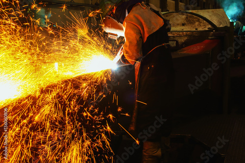 Cuadro en lienzo Welder arc Gouging carbon electrode rods   with sparks and smoke