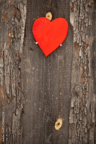 Red heart on a rustic wooden background. St. Valentine's Day