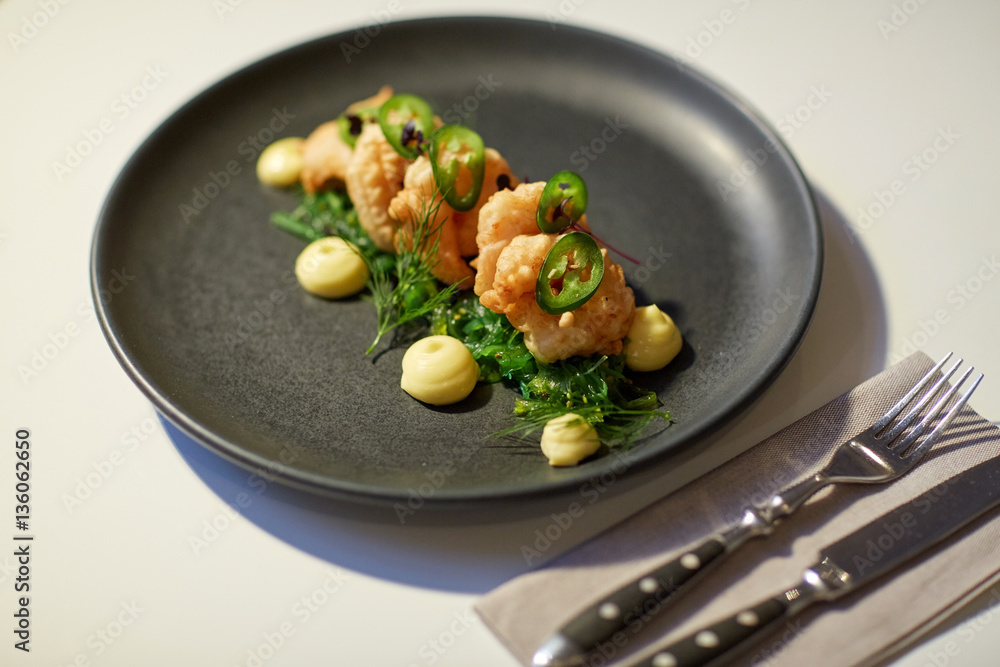 close up of prawn salad with jalapeno and wakame close up of prawn salad with jalapeno and wakame