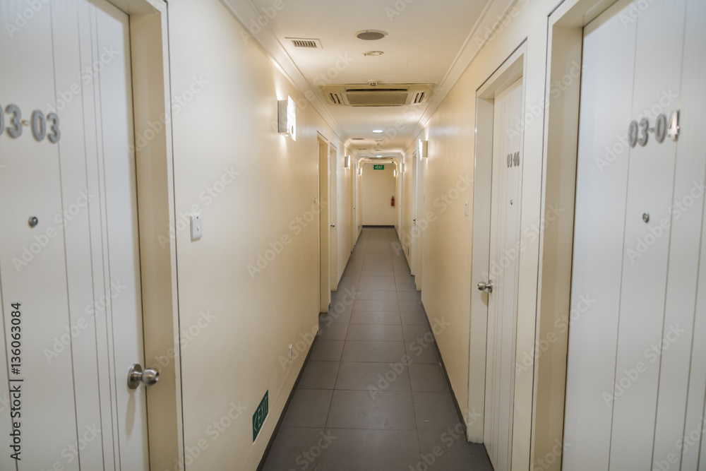 Corridor with closed doors in office residential building or hot Corridor with closed doors in office residential building or hot