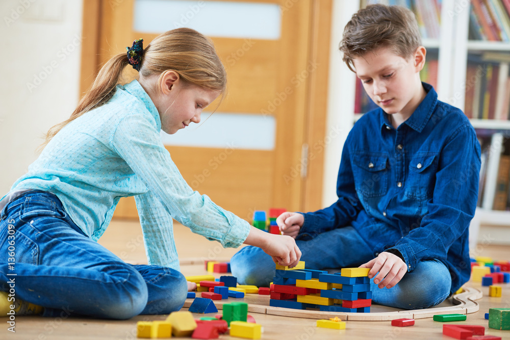 children playing with blocks indoors